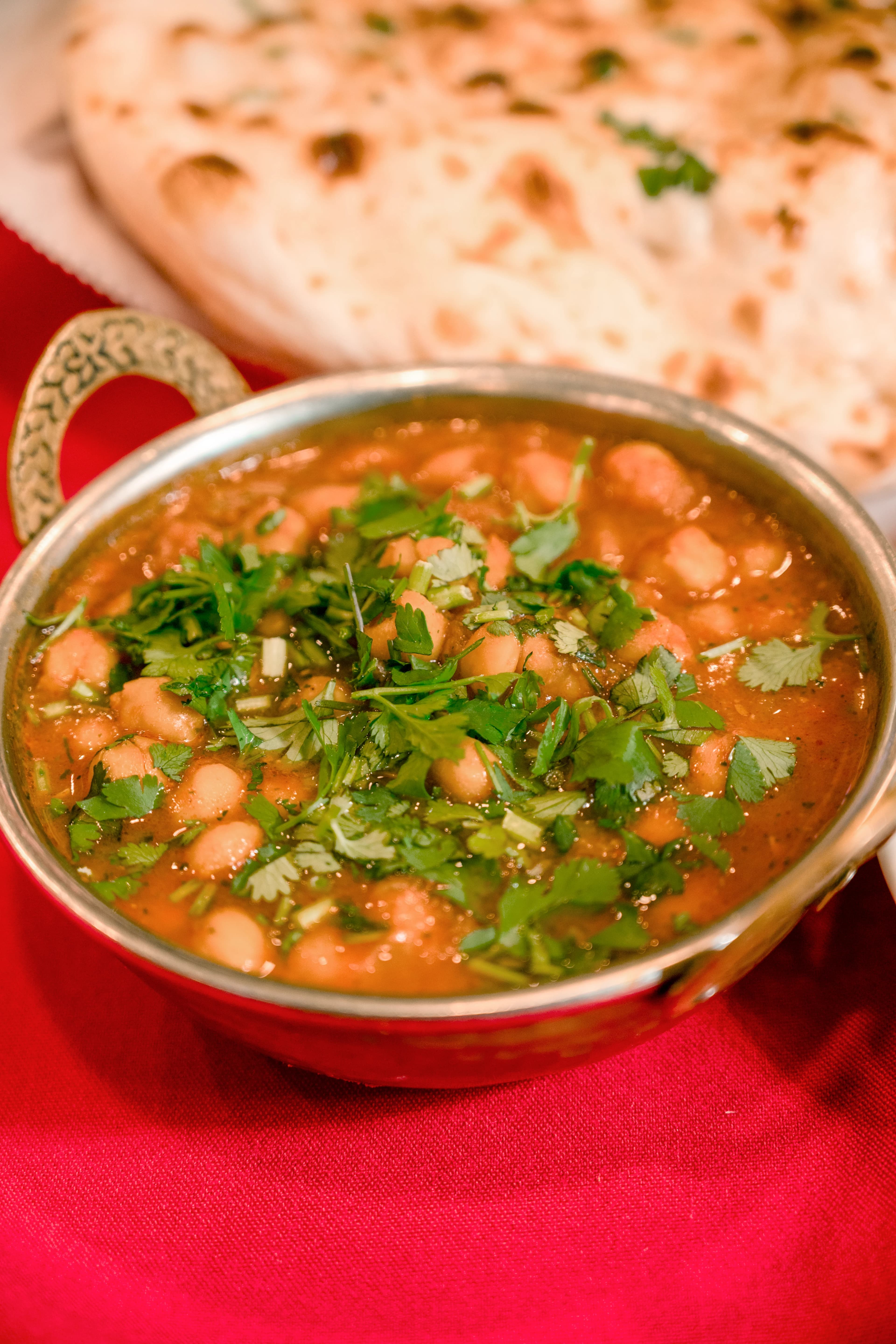 Chana masala topped with fresh cilantro