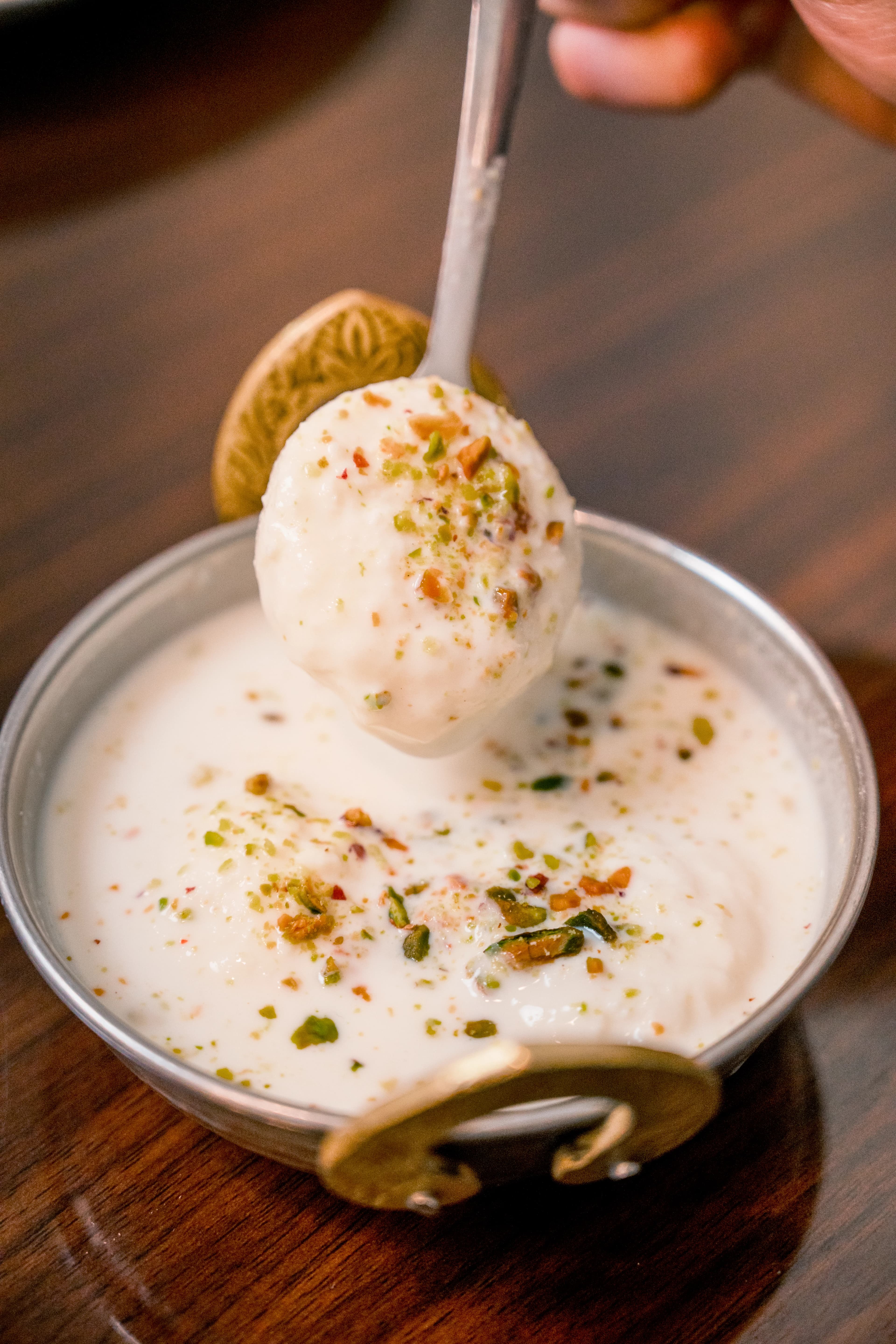 Ras malai dessert in creamy milk sauce