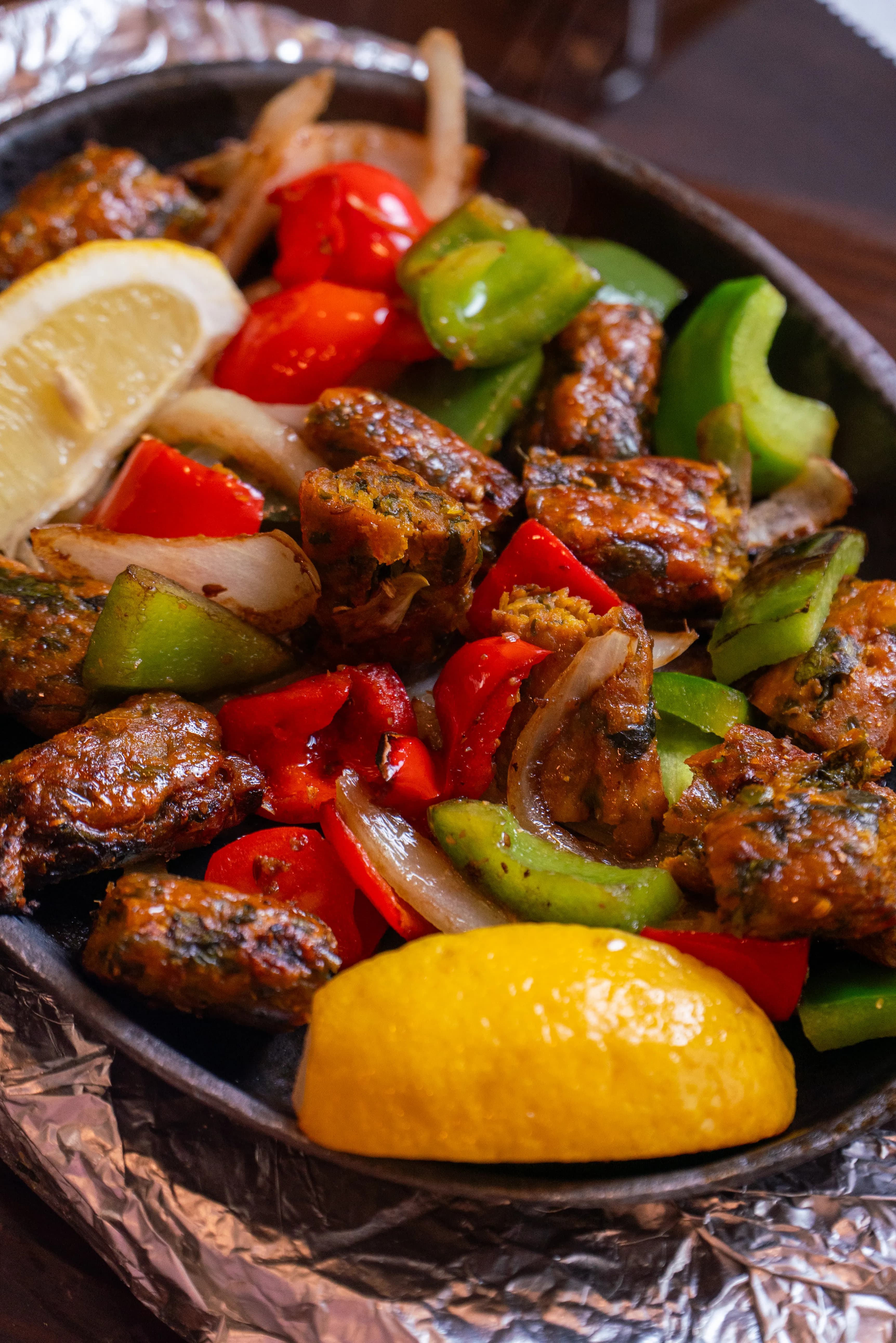 Sizzling shish kebab with peppers and onions